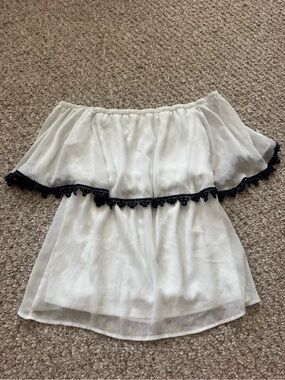 Off-Shoulder White Blouse with Navy Lace Trim